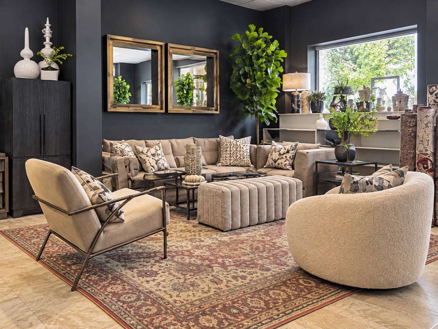 Current College Park showroom seating display arranged around a traditional area rug